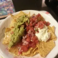 Snapdishの料理写真:Nachos with salsa guacamole and sour cream|Miaさん