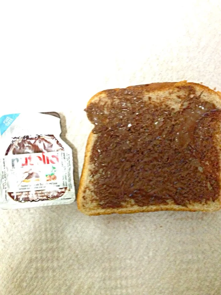 Snapdishの料理写真:Nutella and whole wheat bread (pre workout)|joie chowさん