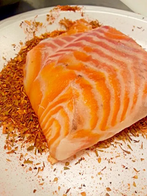 Salmon on top of Cajun seasoning readyvto be Blackend|Tjay Princeさん