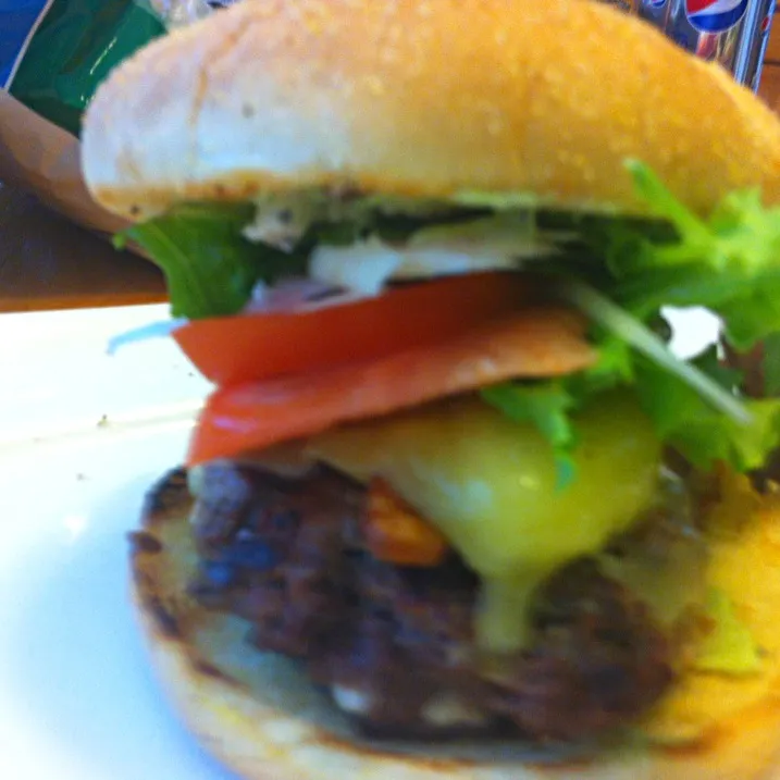 Snapdishの料理写真:Blue cheese, aged Irish cheddar , smoky bacon, basil  mayo, on a ground chuck burger|virginia frasseさん