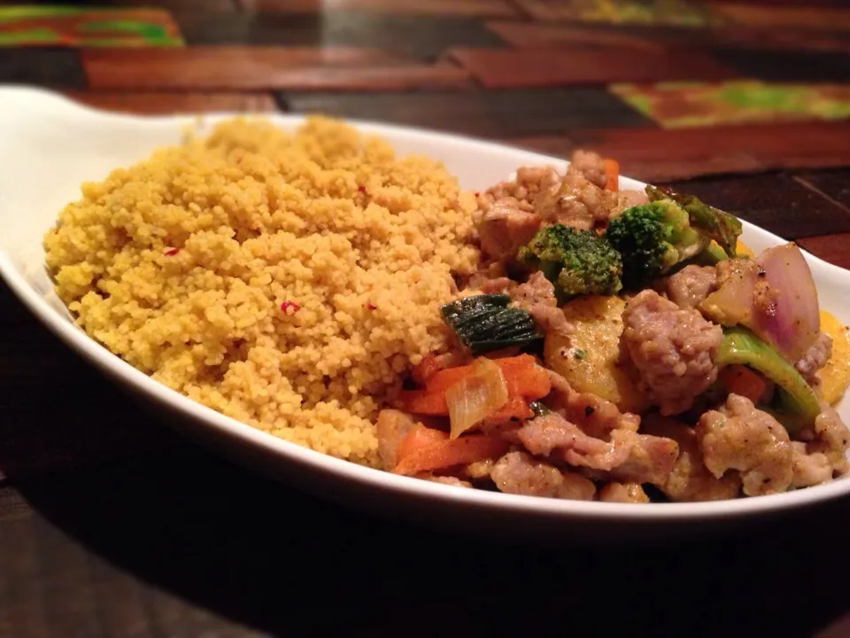 Wok: chicken, bacon, assorted vegetables, 3tbsp cumin, salt&pepper cayenne. Added a few tbsp of greek yoghurt at low temp.And spicy Couscous.|adrianさん