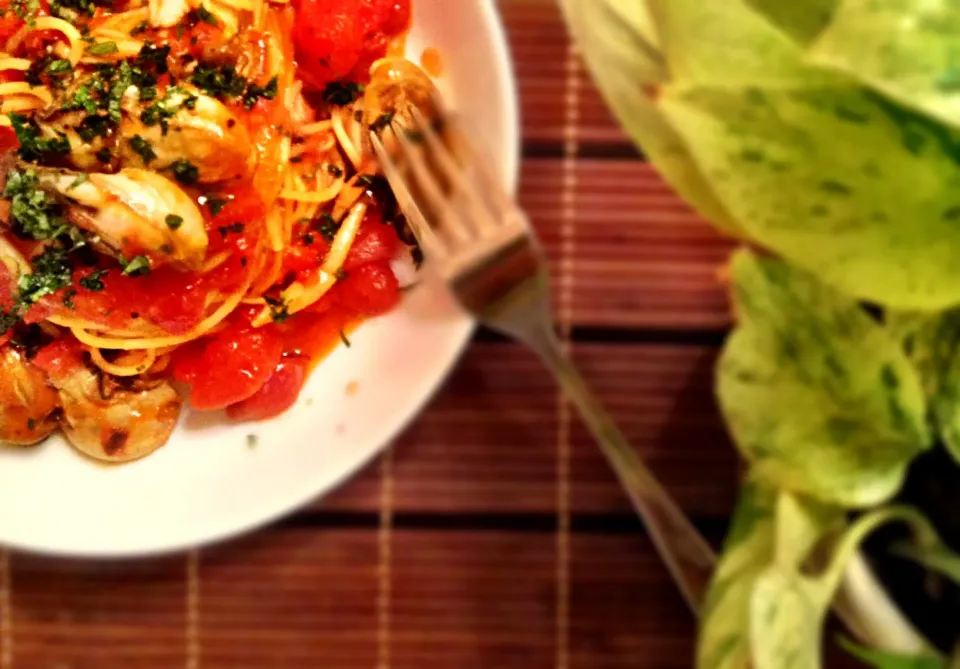 Spaghettini with oysters in tomato cream sauce.|Kirk Awiamさん