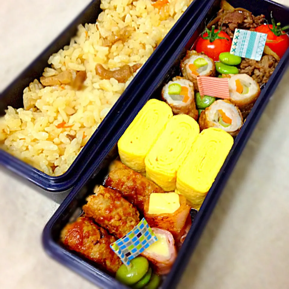 夫用のお弁当♪豚ミンチハンバーグ,肉巻き野菜,卵焼き,ベーコンチーズ,牛肉とゴボウのしぐれ煮,ミニトマト,茶豆,鶏釜飯*|Fumiyoさん