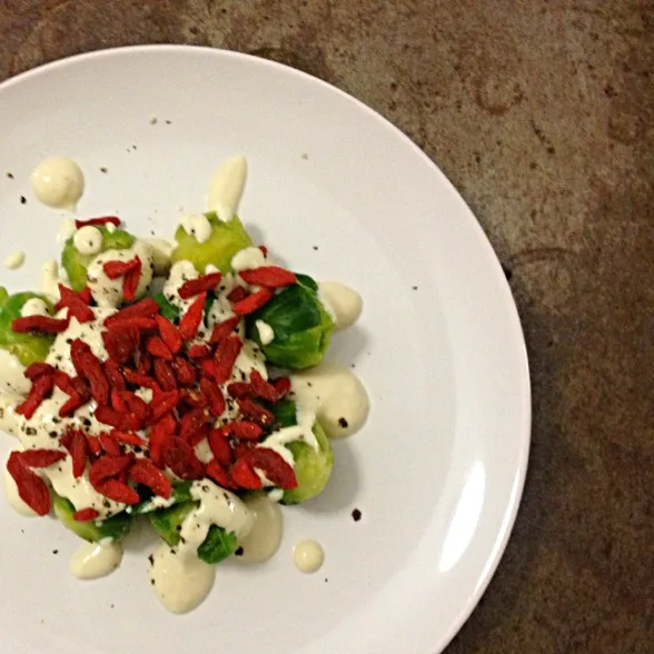 Steamed brussel sprouts, hummus and low fat yoghurt dressing with goji berries and cracked pepper|morgan charlotteさん