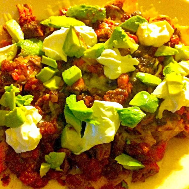 Grilled beef steak nachos with aged white cheddar,  five bean chili, avocado , toasted salsa and sour cream|virginia frasseさん