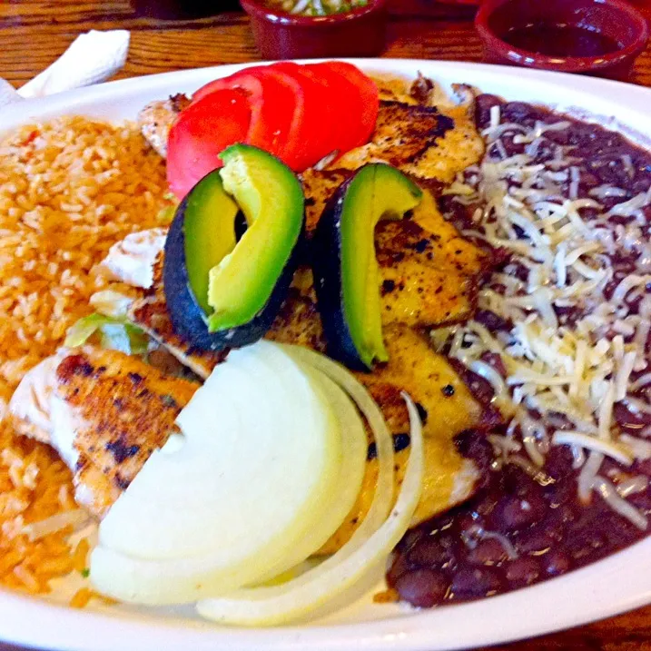 Grilled  talapia, black beans, rice, avocado and tomatoes|virginia frasseさん