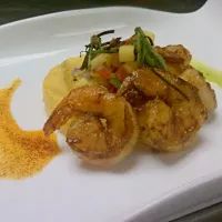 spicy grilled shrimp with coconut polenta and red and green chili oil|Eric andradeさん