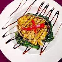 Snapdishの料理写真:Crab stuffed Portabella on a bed of Sautéed Spinach with Balsamic  Reduction|Theran Conradさん