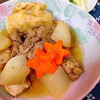 Snapdishの料理写真:鶏肉と卵巾着の甘辛煮|Reisa Matsumotoさん