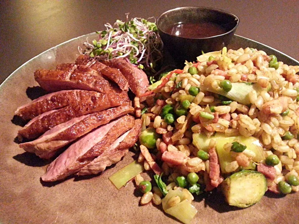 Snapdishの料理写真:Tarly stirfry with ras el hanout, brussels sprouts, green peas with grilled duck breast, plumcompote and radish sprouts|Frank&Jolanda - Eteninbeeldさん