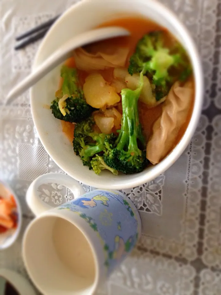 Soup with chicken, tofu, broccoli, potato, yellow tomato; almond milk|joie chowさん