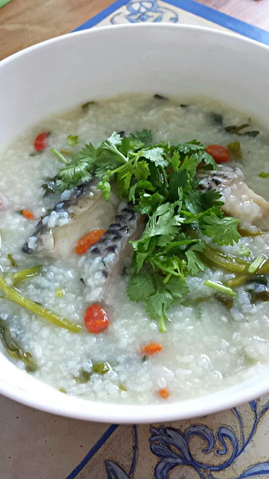 Snapdishの料理写真:Fish porridge with goji berries & watercress|Debbieさん