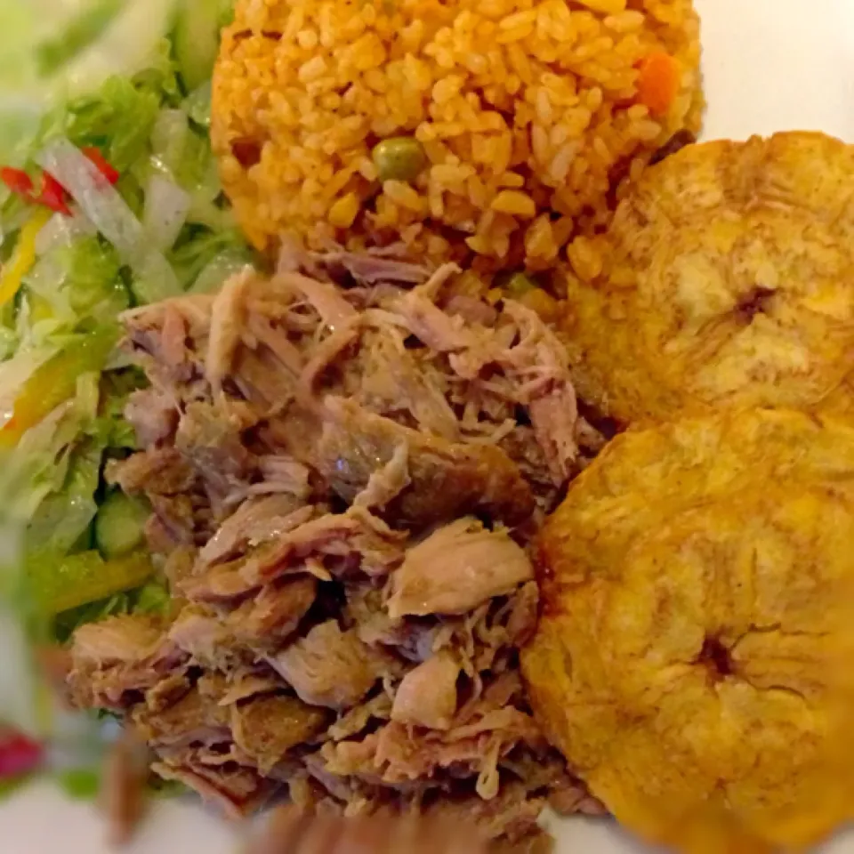 Roast pork with yellow rice,tostones and spanish salad|andrewさん