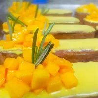 Snapdishの料理写真:Mango-passionfruit eclairs|evaさん