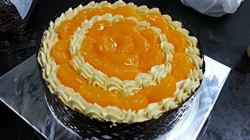 Snapdishの料理写真:Golden Orange Net Cake from Celebrations Fine Confections Mumbai Breach Candy|Mehernosh Kersi Khajotiaさん