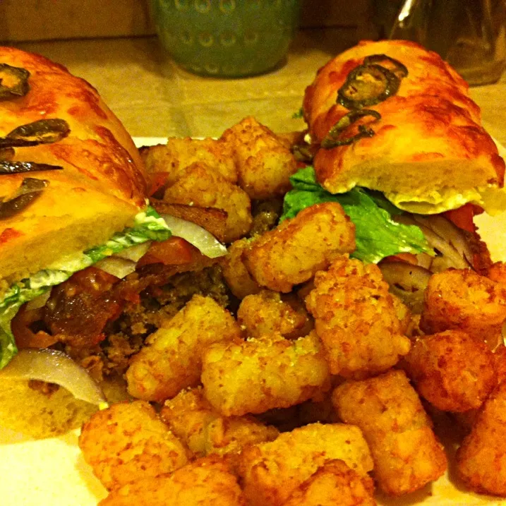 Bacon burgers and tots on cheddar jalepeno bread|virginia frasseさん