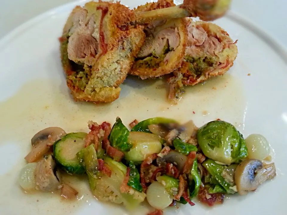 Sundried Tomato and Spinach Stuffed Chicken Lollipop with Braised Brussel Sprouts, Pearl Onion and Bacon Gastrique|Dustin Stairさん