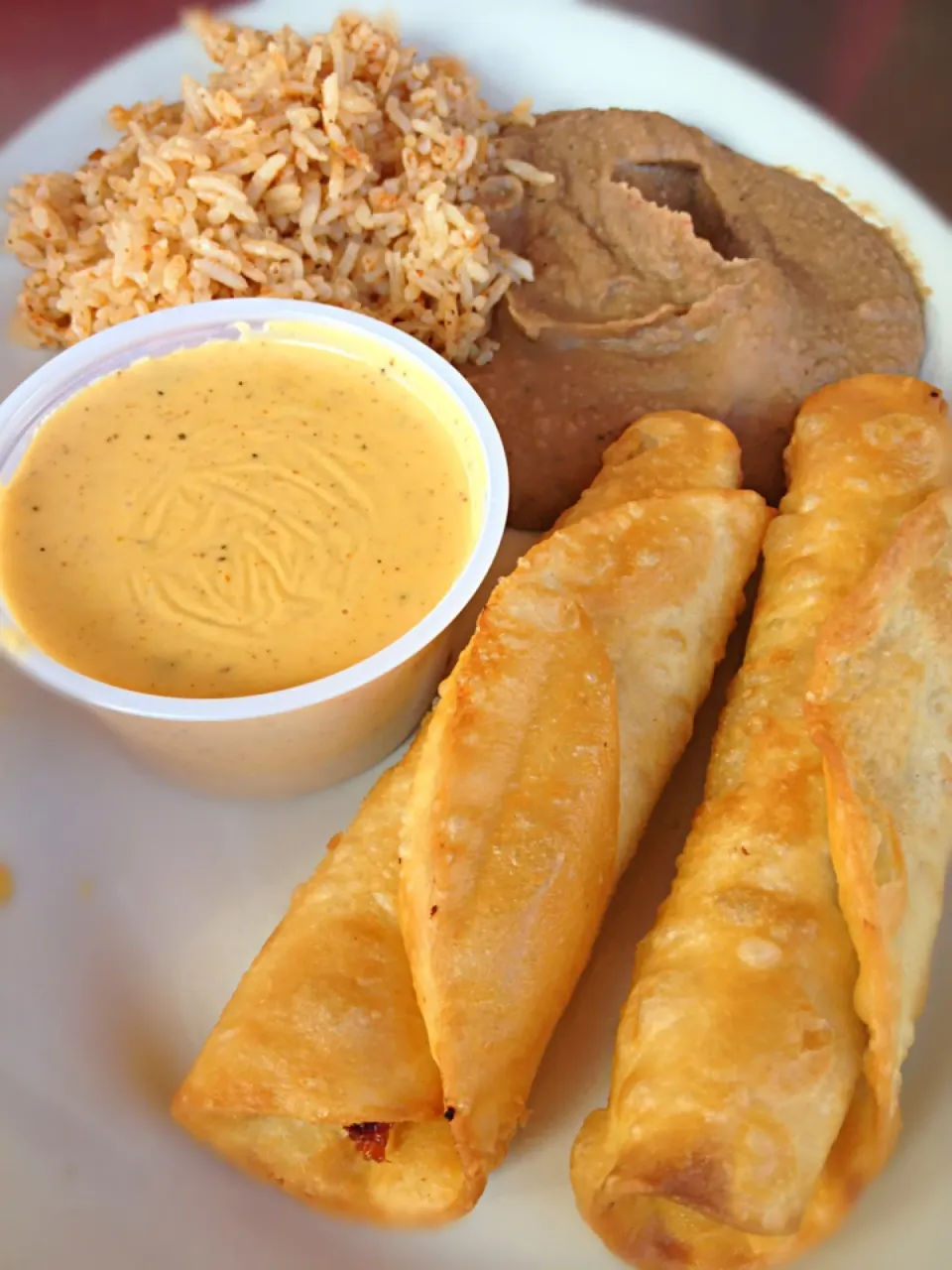 Chicken Flautas, queso, with brand and rice|Elise Templetさん