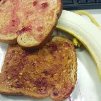 Snapdishの料理写真:Peanut butter and jelly sandwich with banana.|Jorelさん