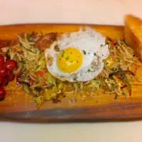 Snapdishの料理写真:Crispy potato stings with caramelized onion, sauteed peppers, duck confit and fried egg|Patrick fennさん