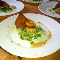 Snapdishの料理写真:Fennel marinated scallops atop peashoot and pickle cucumber salad with pear and bacon vin. And a pear chip as garnish.|Roberto A. Parrillaさん