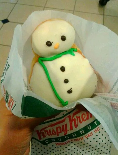 Snow man doughnut at Krispy Kreme. cute!|Frannyさん