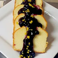 Snapdishの料理写真:fresh baked pound cake with blueberry lemon topping.|Kevin Fatbelly Coleさん