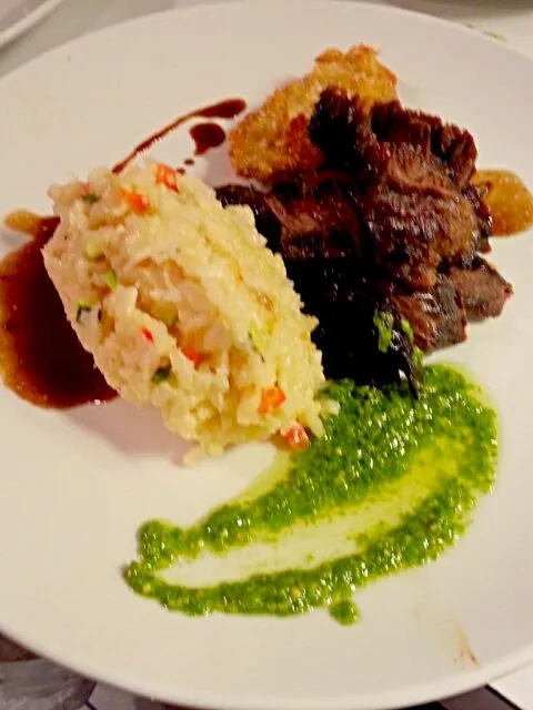 Marinated Skirt Steak with Balsamic Gastrique, Confetti Risotto, and Basil Pesto|Dustin Stairさん