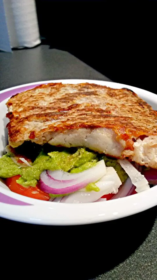 Crispy Skin Snapper on a salad bed of avocado, raddish sprouts, tomato and red onion|mystefan11さん