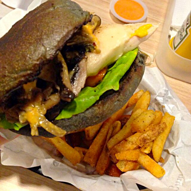 charcoal burger with grilled chicken and mushroom plus cheese/joey lim