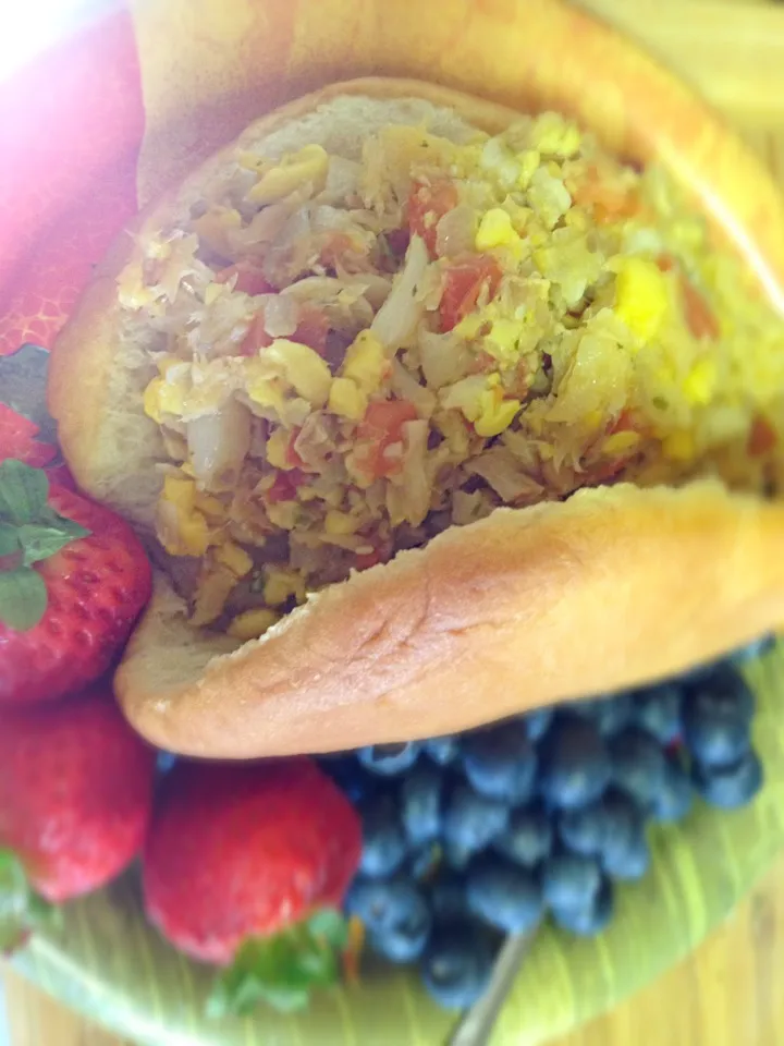 Bacalao salted fish and co co bread with a side of fresh fruits|Carlson Grayさん