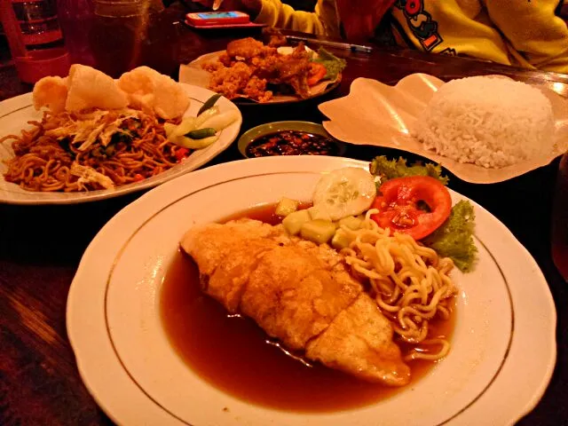 Snapdishの料理写真:(left to right) Mie Goreng Pedas, Pempek Kapal Selam, and Ayam Goreng Kremes|Amanda Viraさん