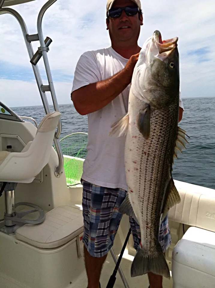 Snapdishの料理写真:I caught a striped bass. Grilled it and topped it w a tangerine caper buerre blanc.|Sean 🏄🍷🍝🎿🔪🍍さん