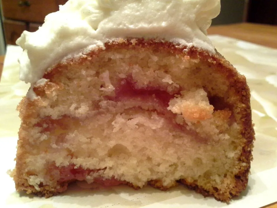 Snapdishの料理写真:Raspberry ripple coconut cake slice.  Topped with coconut yogurt butter cream.|Fe's kitchenさん