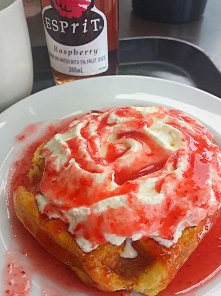 belgian waffle topped with whipped cream and strawberry syrup|PauLeNeさん