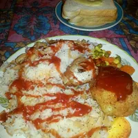 Chicken parmigiana, Turkish style rice, peas, corn and white bread|Bloodexさん