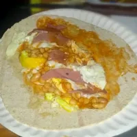 eggs baked beans and beef slices on tortilla breal|Muhammad Ba Atwahさん