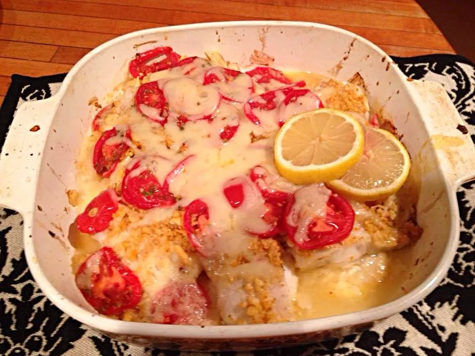 Baked haddock with tomatoes , panko bread crumbs, motzarella cheese|Michele Fortunatiさん