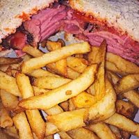 Smoke meat sandwich (on gluten free millet chia bread) and French fries|sami chazさん