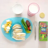 Snapdishの料理写真:Snack: peanut butter sandwiches with fruit juice.|Claire Tyler-Smithさん