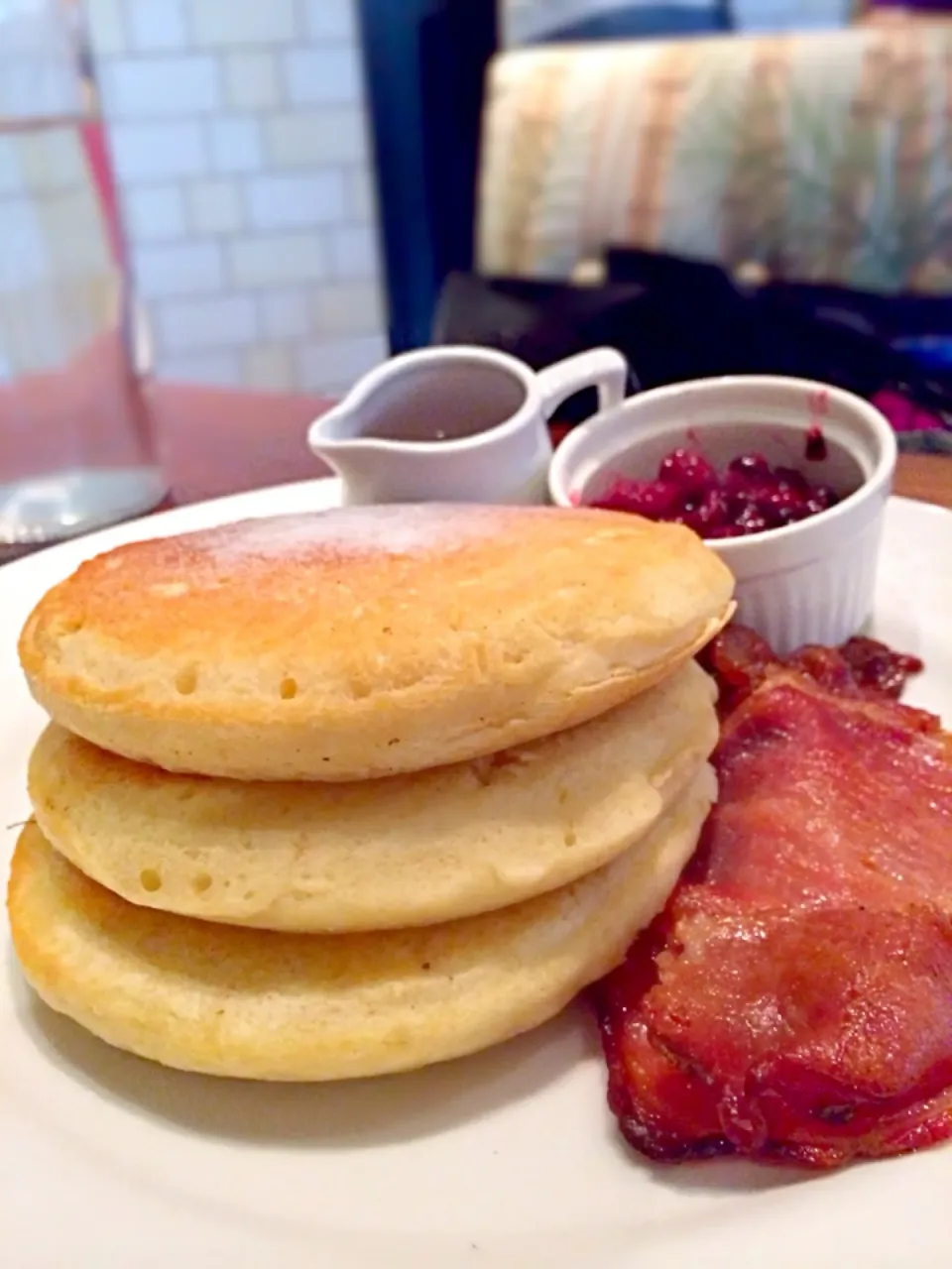 Canadian Breakfast - pancakes with Canadian bacon, imported Canadian maple syrup, and candied cranberries|k panさん