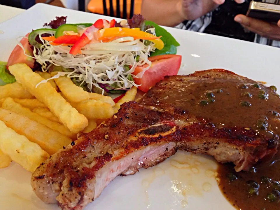 Snapdishの料理写真:Pork chop steak|Vorapoatさん