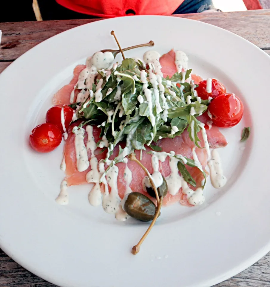 Snapdishの料理写真:Smoked salmon carpaccio with rocket salad|Navapat Inmelbourneさん