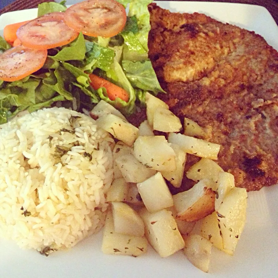 Milanesa with side of herb rice, roasted potatoes & salad|killyさん