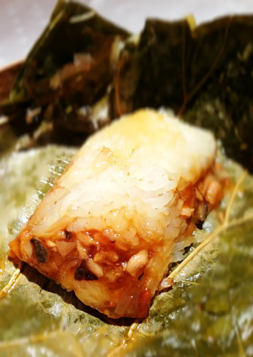 Snapdishの料理写真:Glutinous rice in lotus leaf@Imperial Treasure, Great World City|coxiella24さん