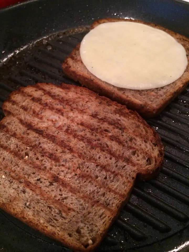 Cabin Fever Multigrain Bread w/ dates, raisins, pecans, walnuts, honey & sea salt and  Provolone Cheese|Curt Chillさん