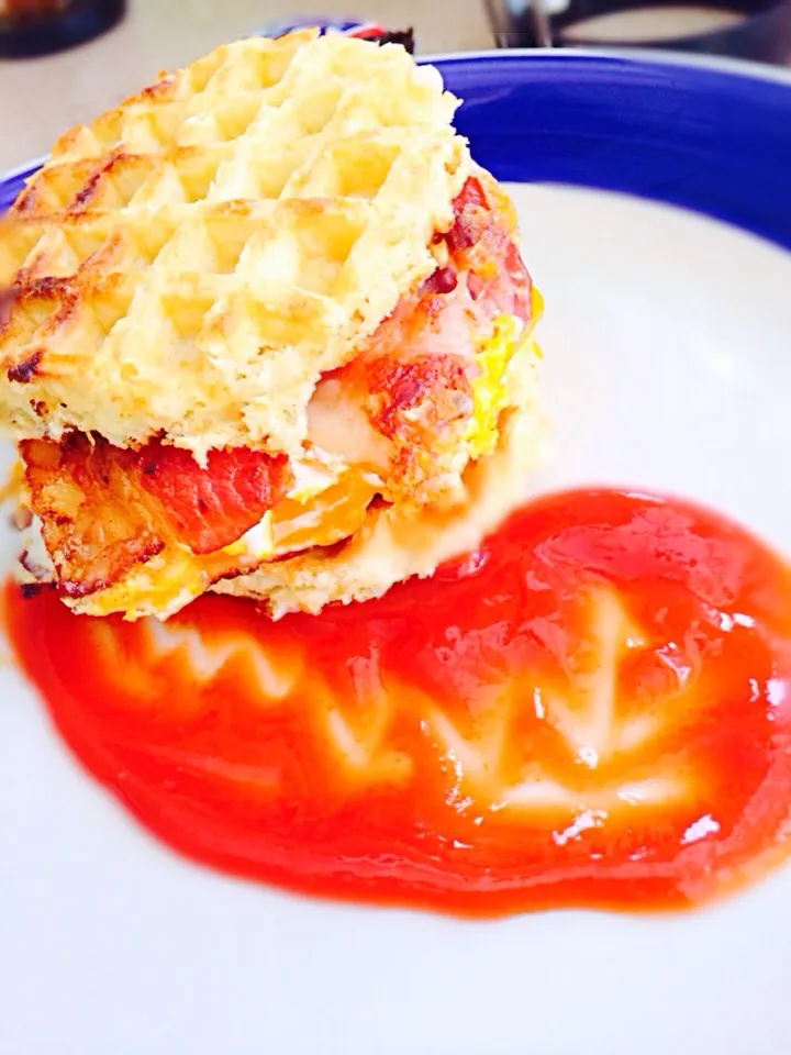 Breakfast sandwich- waffle, egg, cheese and Tobasco ketchup|Kirby Gholsonさん