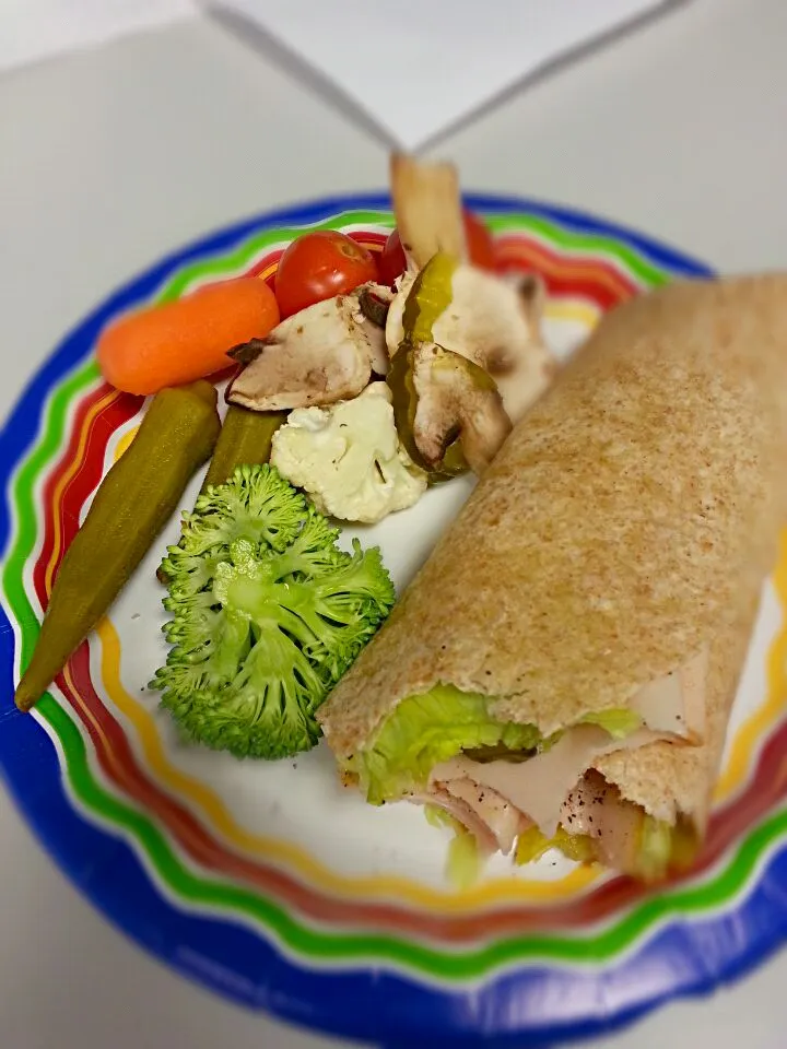 mixed fresh veggies & chicken, lettuce, pickle on wheat wrap w/ mustard & pepper.|NMorgan:)さん