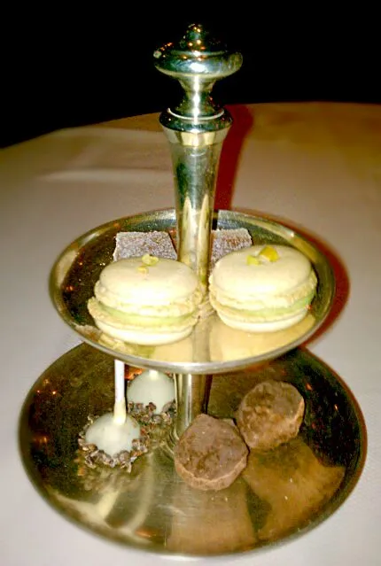 Dessert tray for two: Dark chocolate truffles, hazelnut macaroons, pistachios cake pops & apricot candies|Jiraphon Gさん