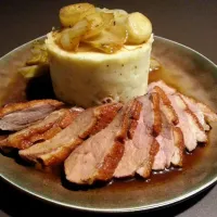 Duck breast with mashed potatoes and sweet and sour chicory